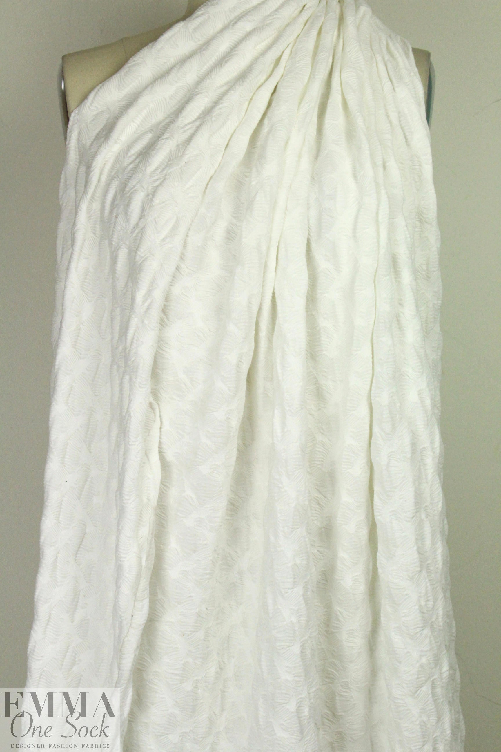 famous designer textured white novelty knit