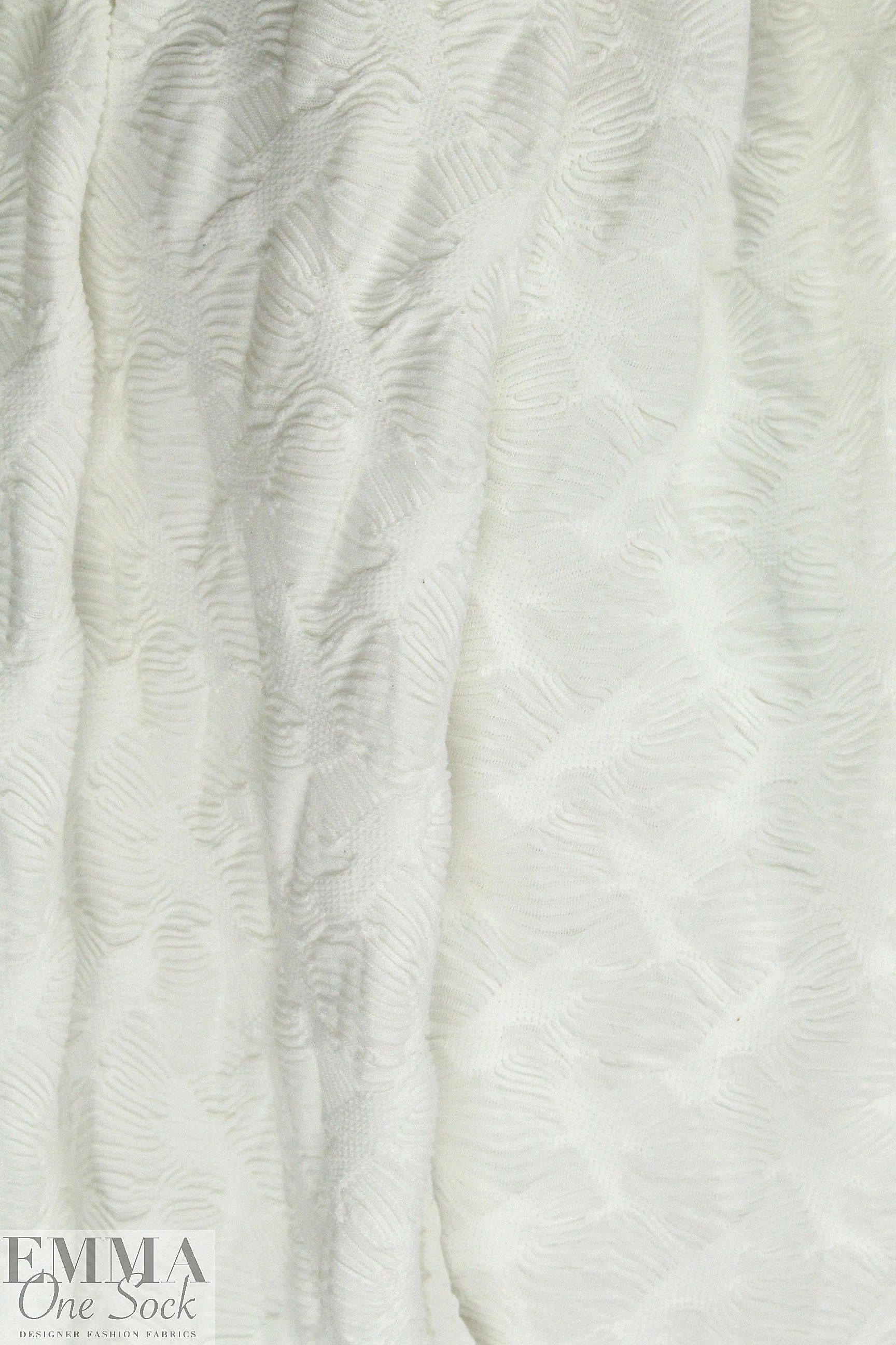 famous designer textured white novelty knit