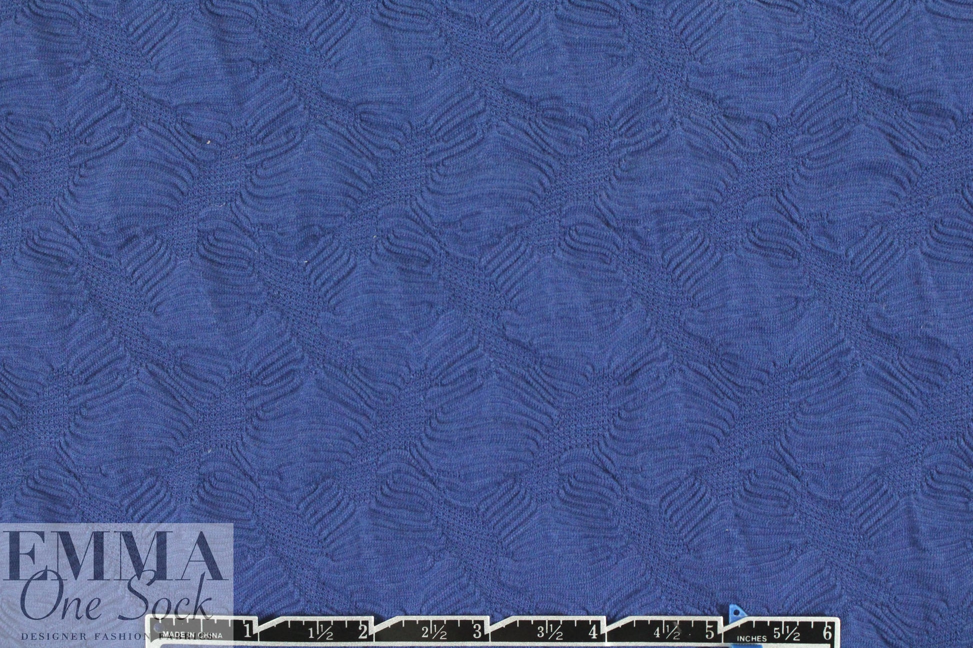 famous designer textured blue novelty knit