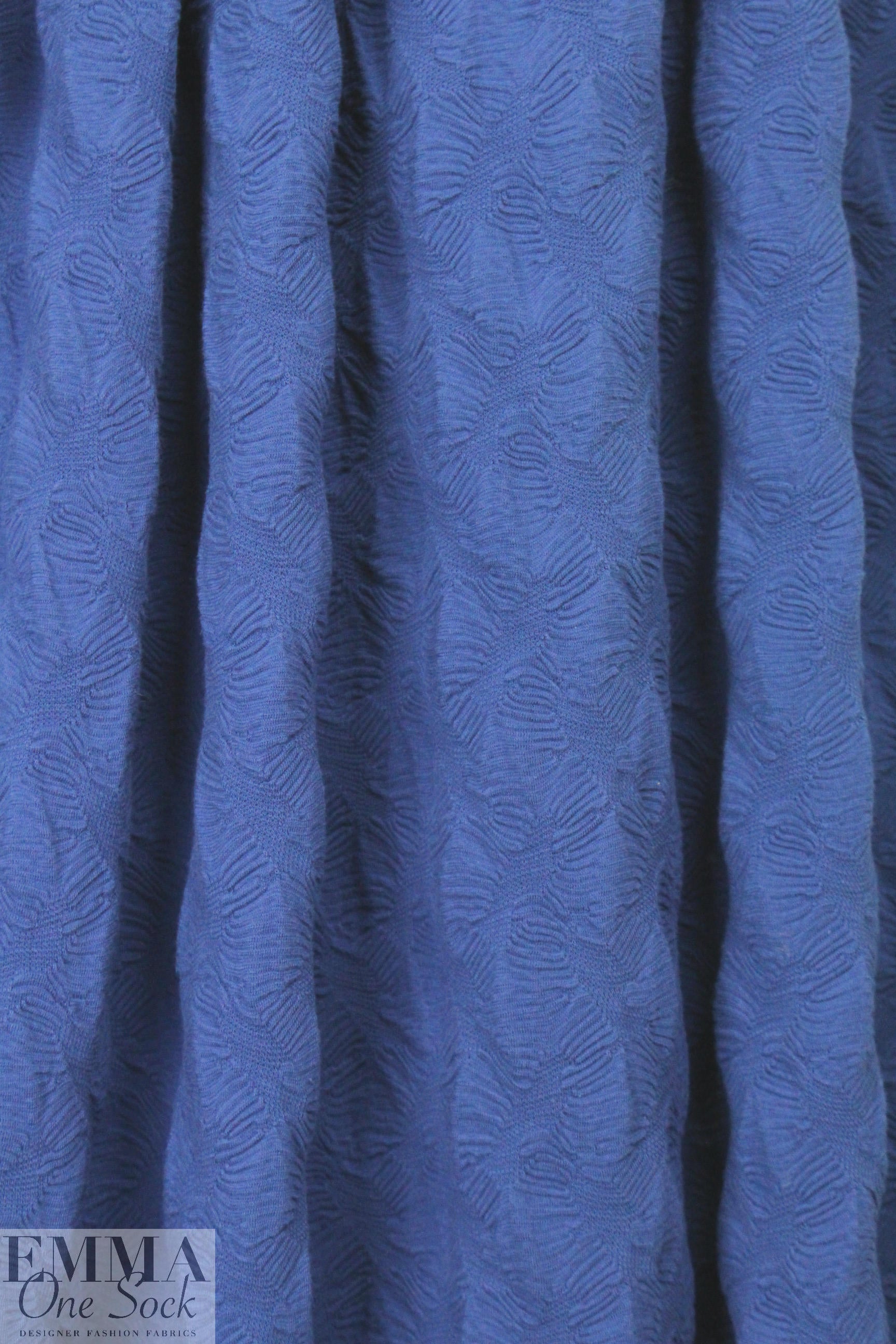 famous designer textured blue novelty knit