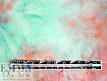 NY designer tie dye poly knit - coral/jade .75 yds