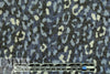 heathered, printed sweater knit - spotted denim .5 yds