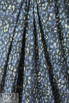 heathered, printed sweater knit - spotted denim .75 yds