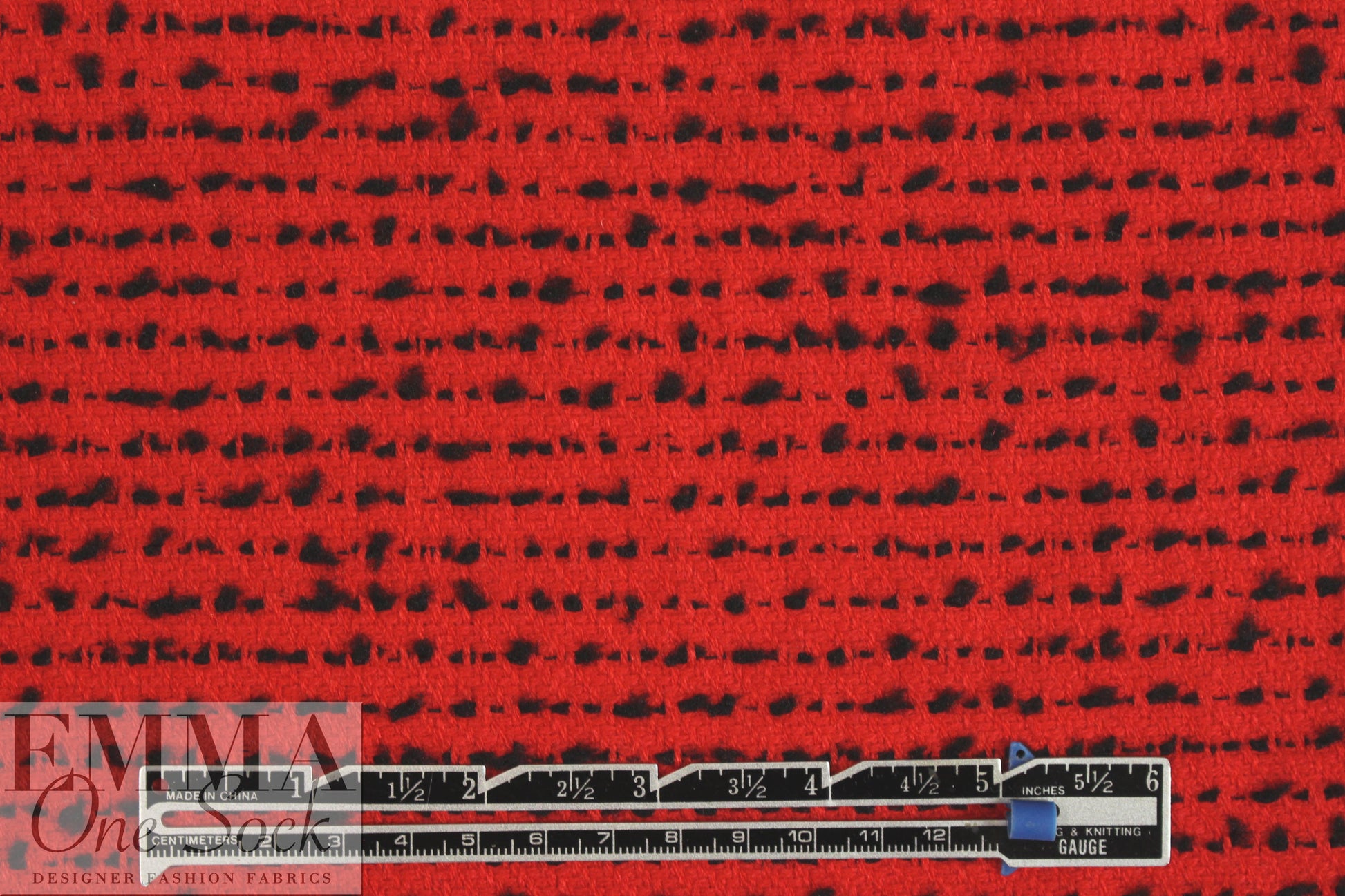 NY designer black on red dot boucle' suiting .625 yds
