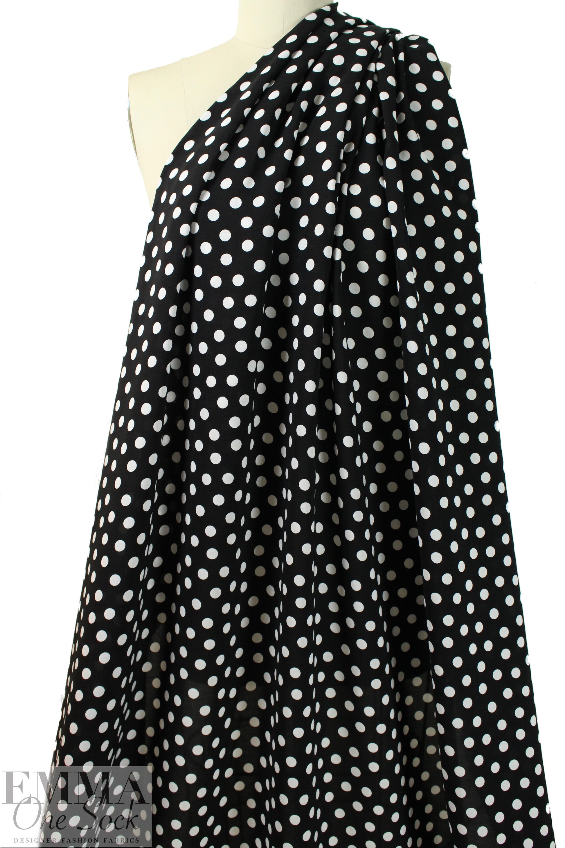 Italian white on black dot drapey viscose woven