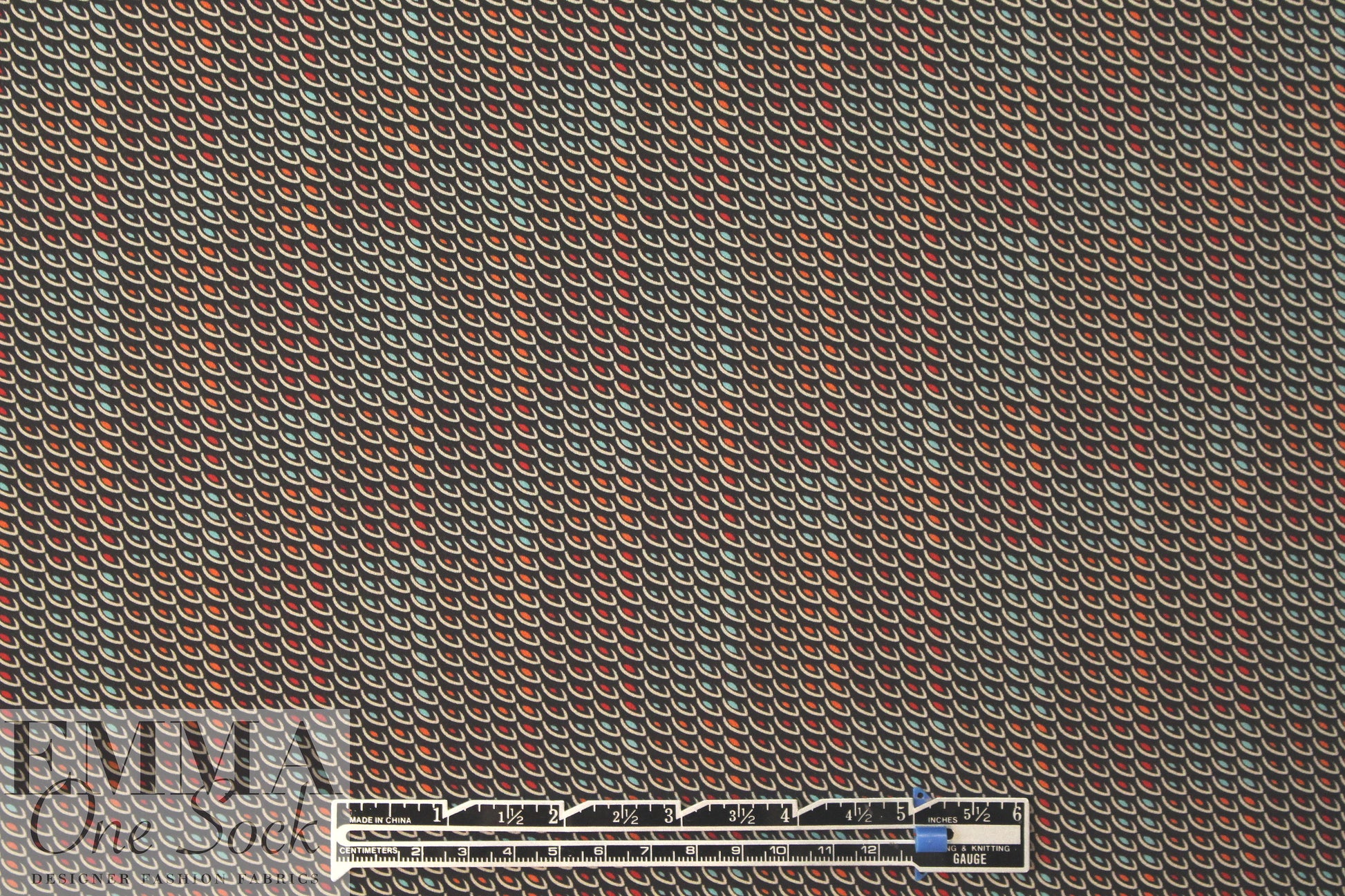 Italian little overlapping graphic poly georgette 1.66 yd