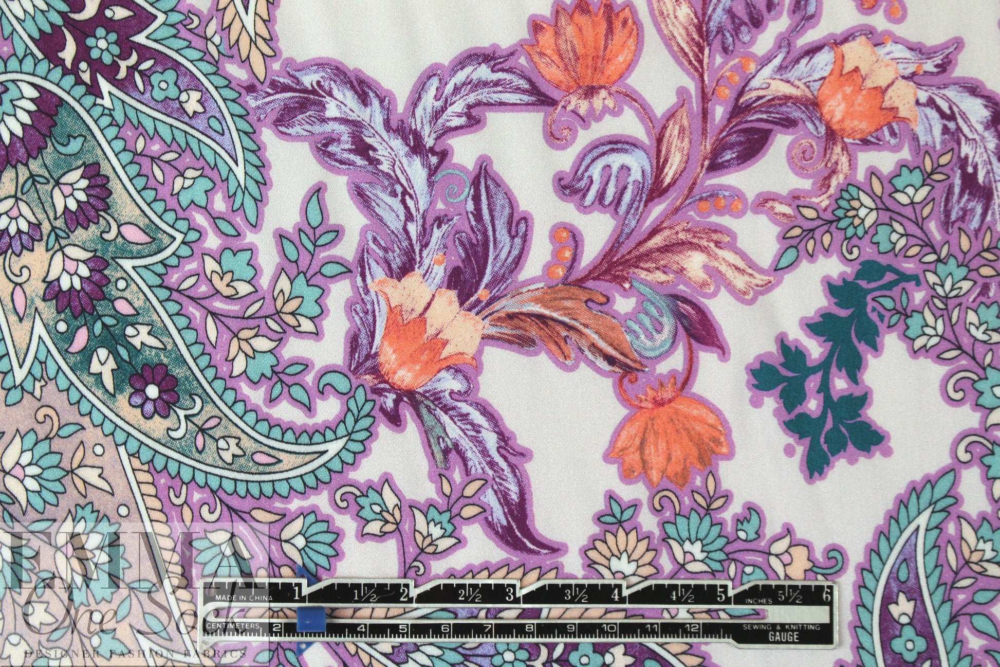 Italian coral/wisteria paisley satin finish viscose woven .625 yds