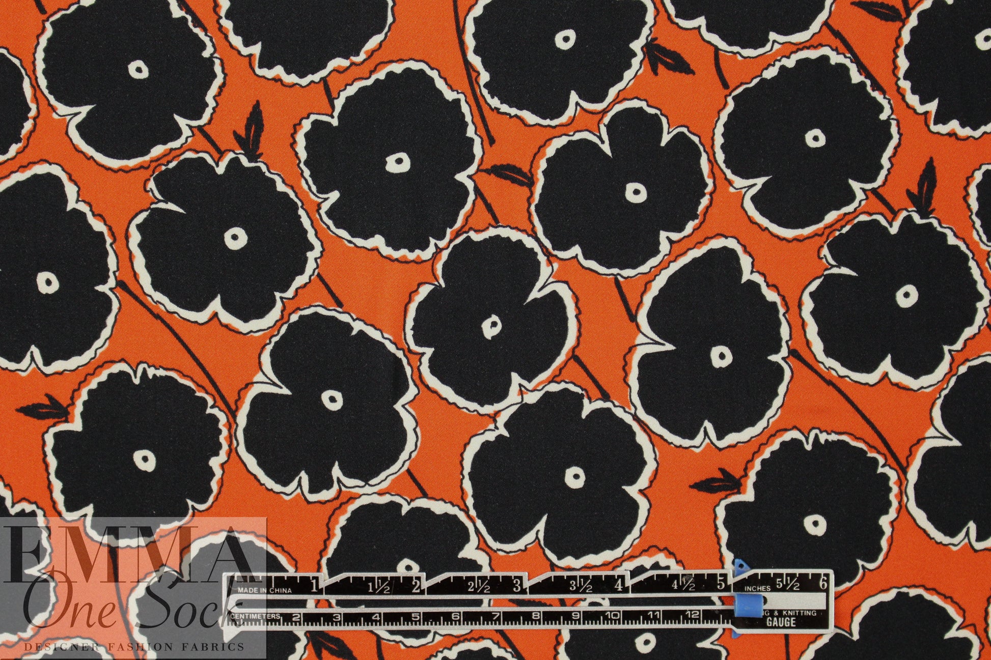 Italian black/hot orange stylized flowers viscose challis