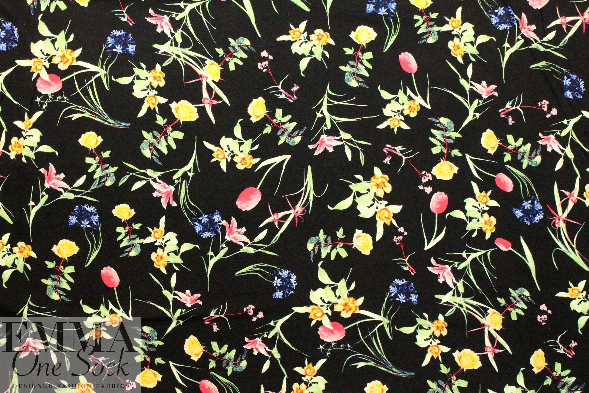 spring flowers on black drapey viscose woven 1.125 yds