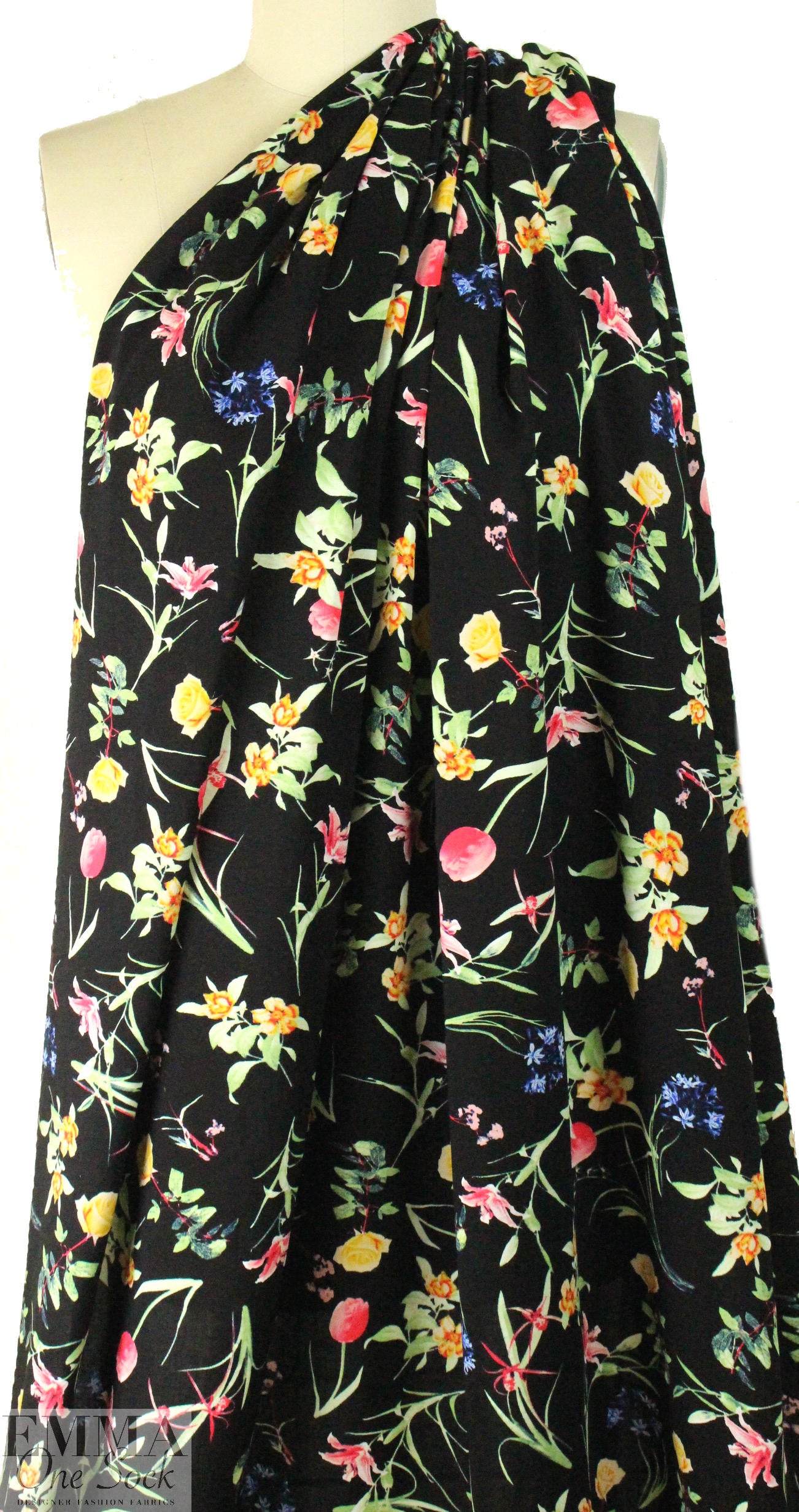 spring flowers on black drapey viscose woven