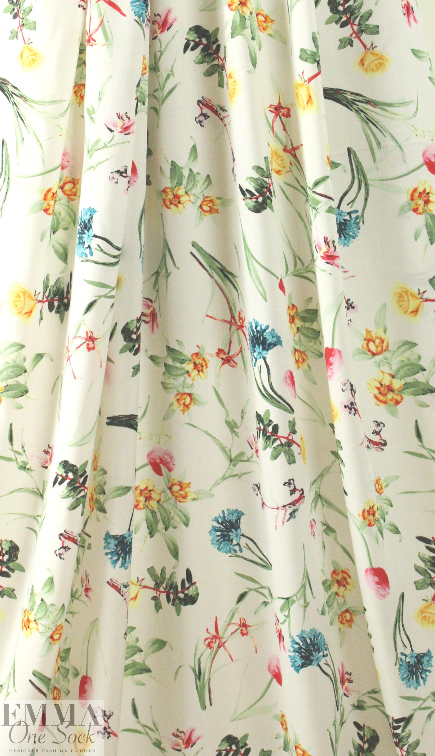 spring flowers on white drapey viscose woven
