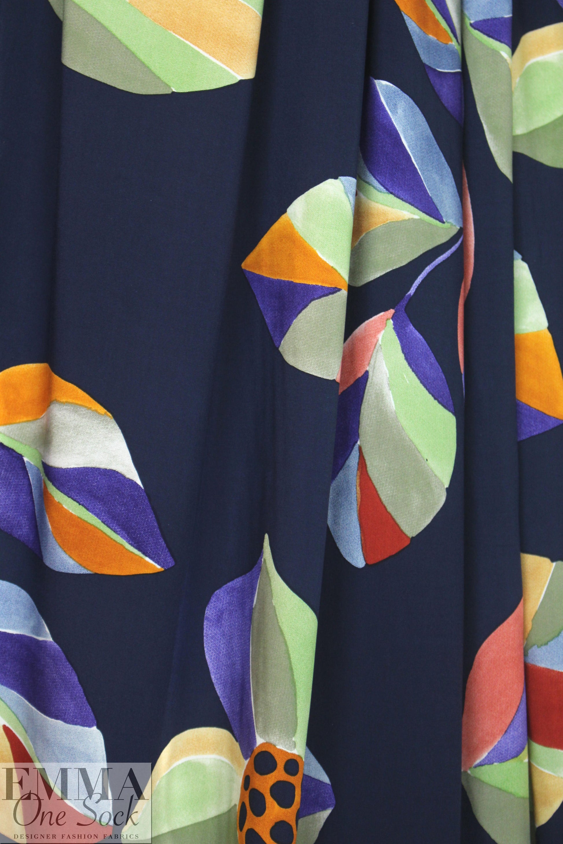 stylized floral on navy drapey viscose woven 1.375 yds