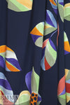 stylized floral on navy drapey viscose woven 1.5 yds