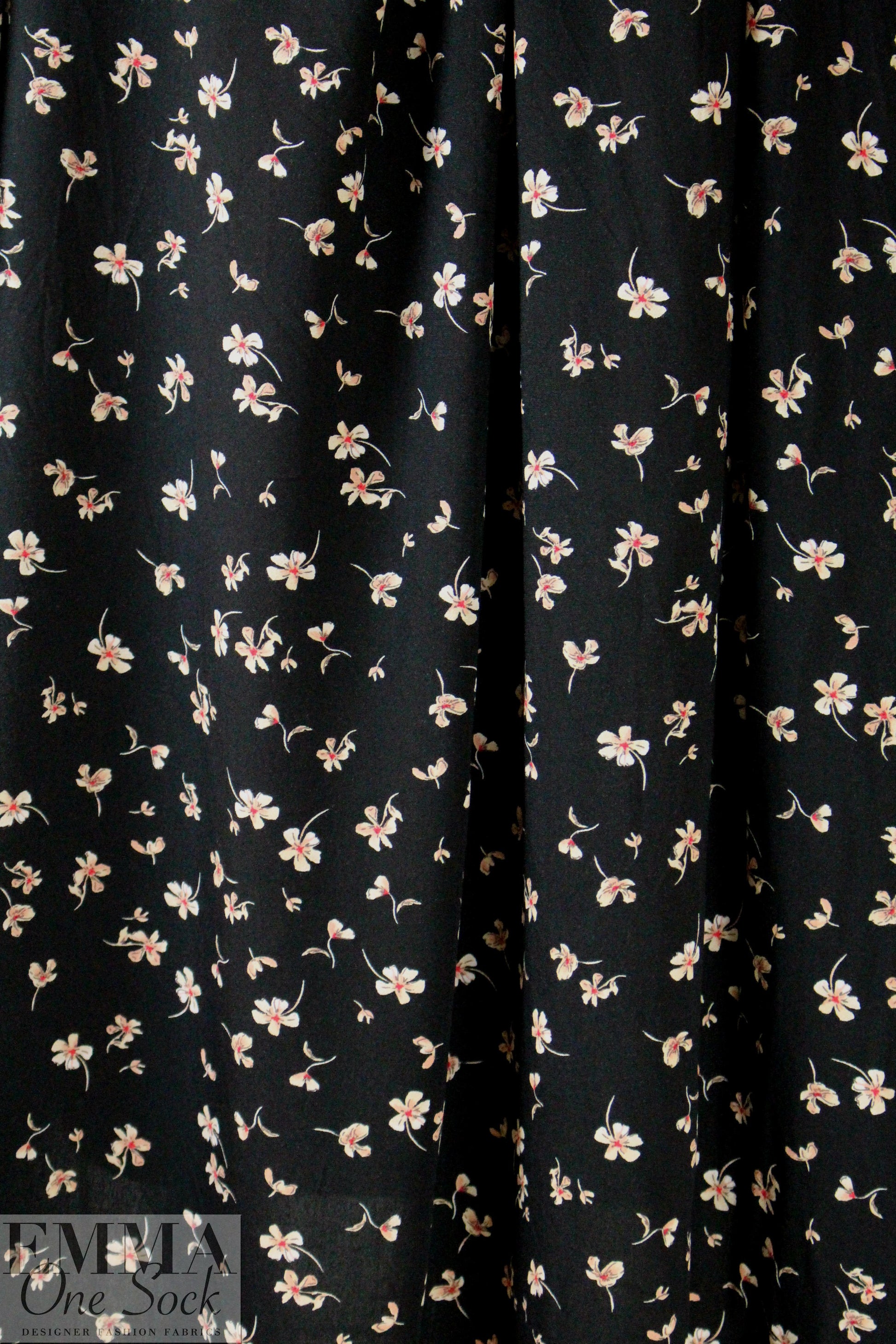 falling blossoms on black drapey rayon woven 1.25 yds