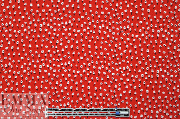 teeny flowers on cherry drapey rayon woven 1 yard