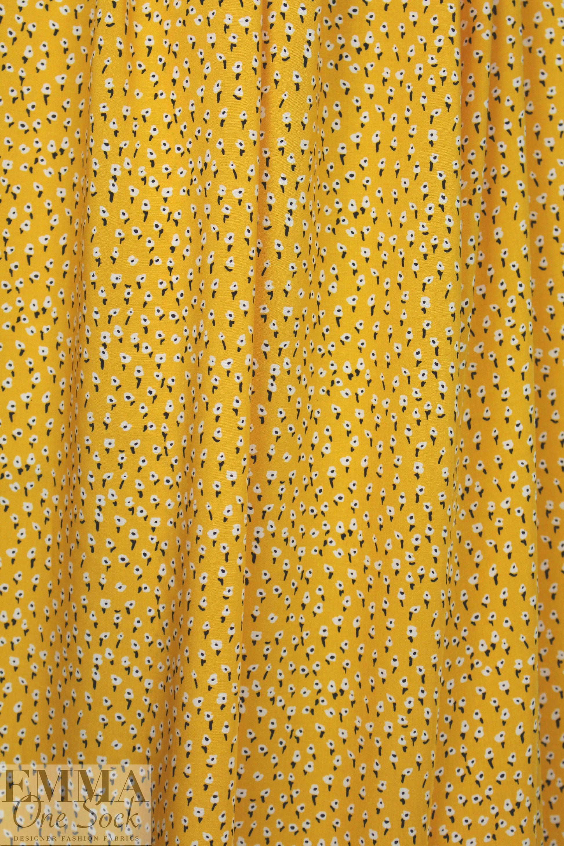 teeny flowers on buttercup drapey rayon woven .625 yds