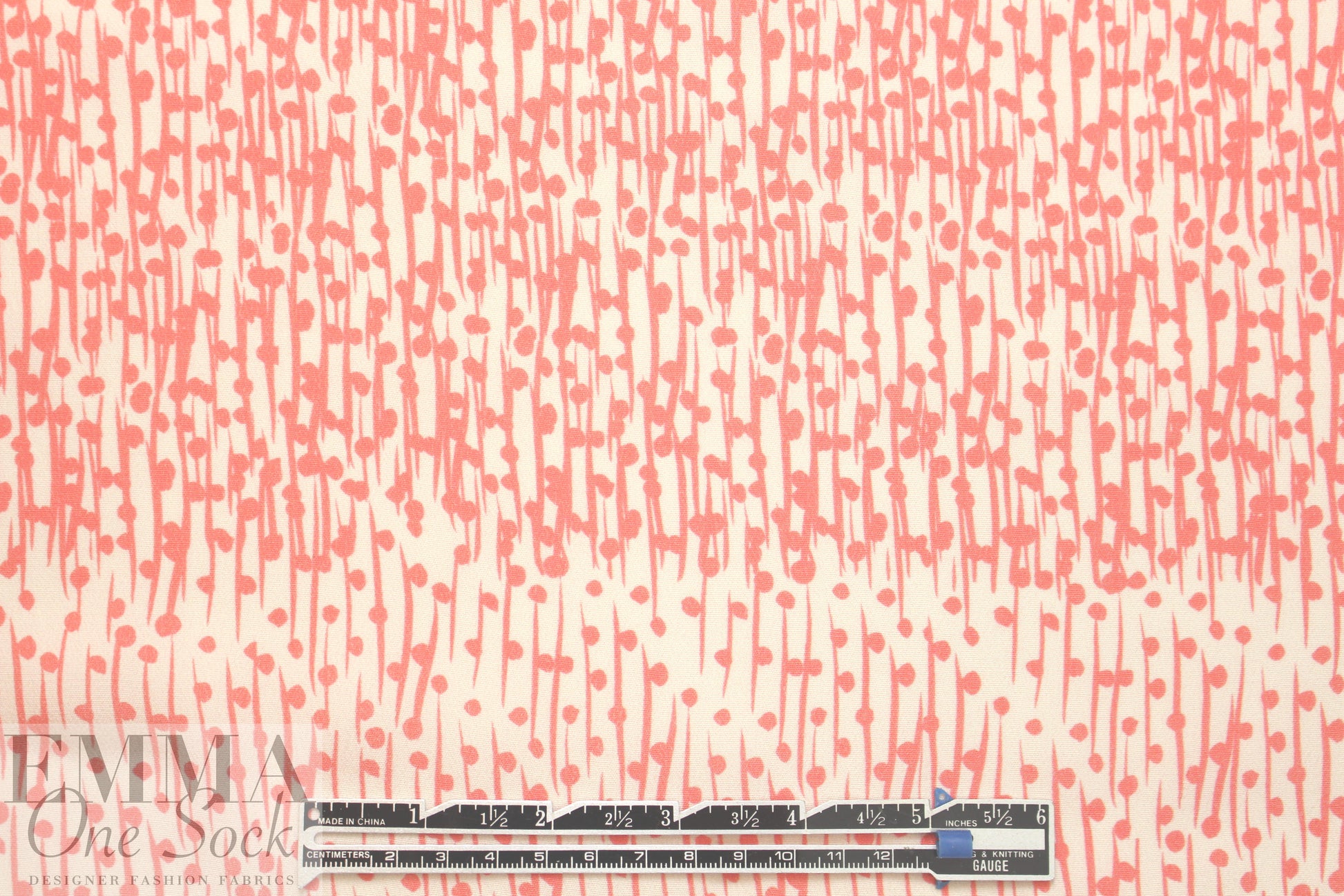 CA designer salmon dot-slash printed viscose crepe
