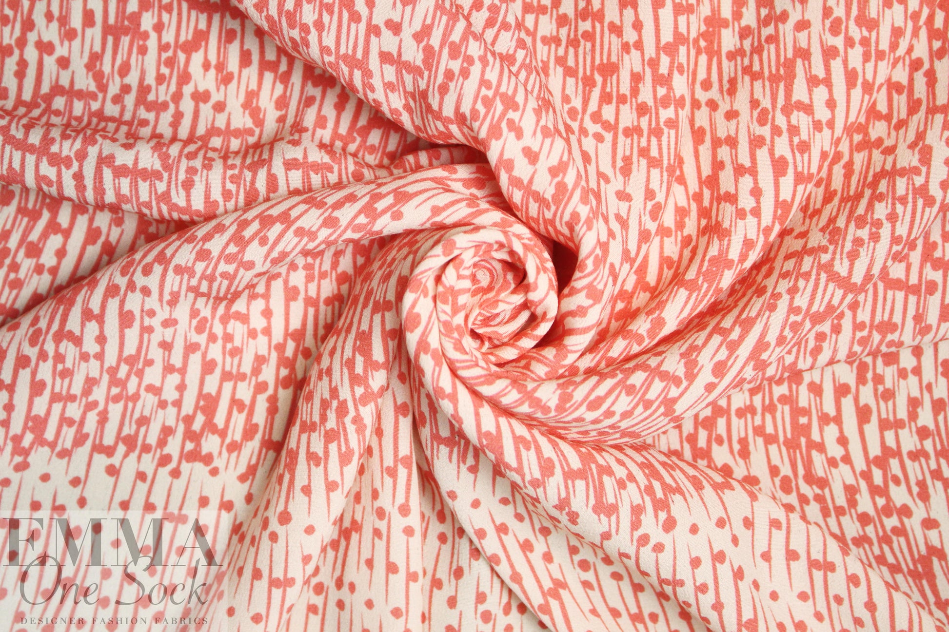 CA designer salmon dot-slash printed viscose crepe 1.5 yd