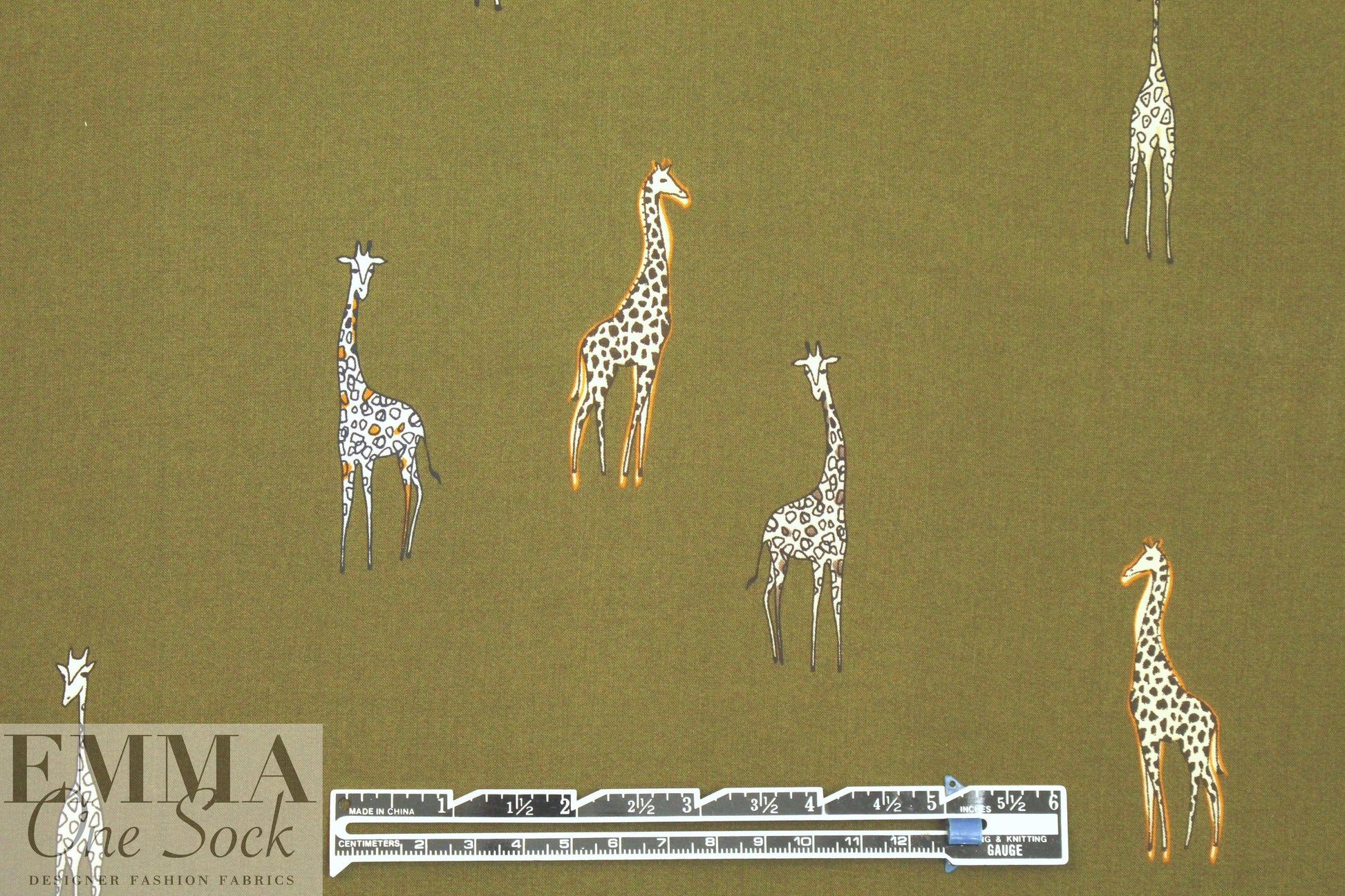Italian drapey viscose woven - giraffes on olive .875 yds