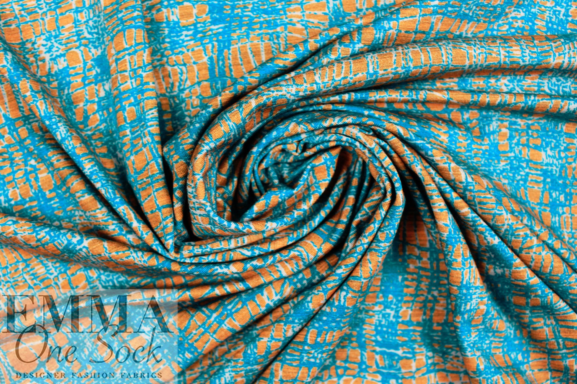Italian 'fiber optics' viscose/spandex knit - azure/bisque .625 yds