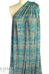 Italian 'fiber optics' viscose/spandex knit - azure/bisque .625 yds