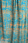 Italian 'fiber optics' viscose/spandex knit - azure/bisque .625 yds