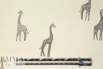 Italian drapey viscose woven - giraffes on ivory 1 yard