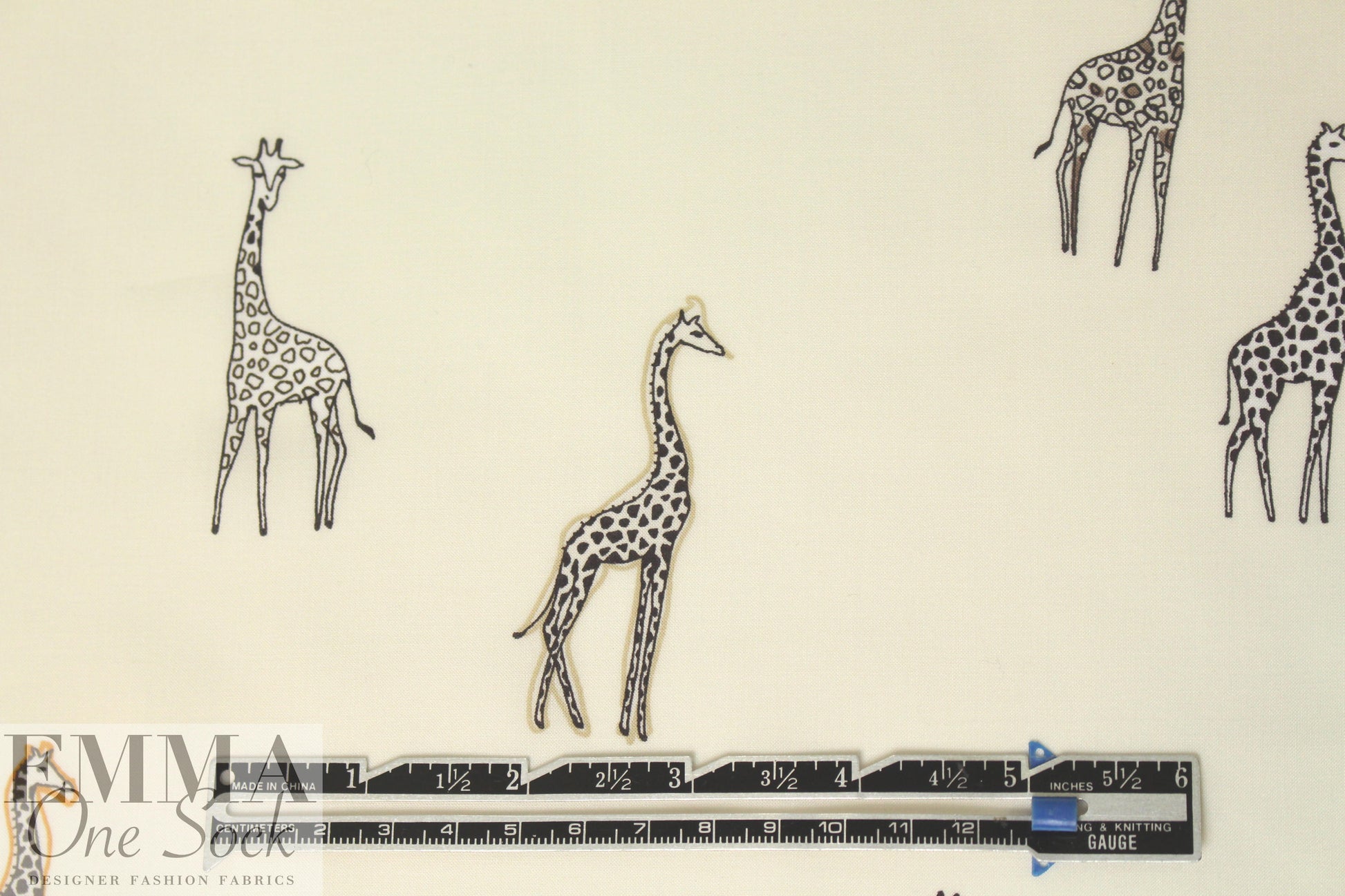 Italian drapey viscose woven - giraffes on ivory 2 yds