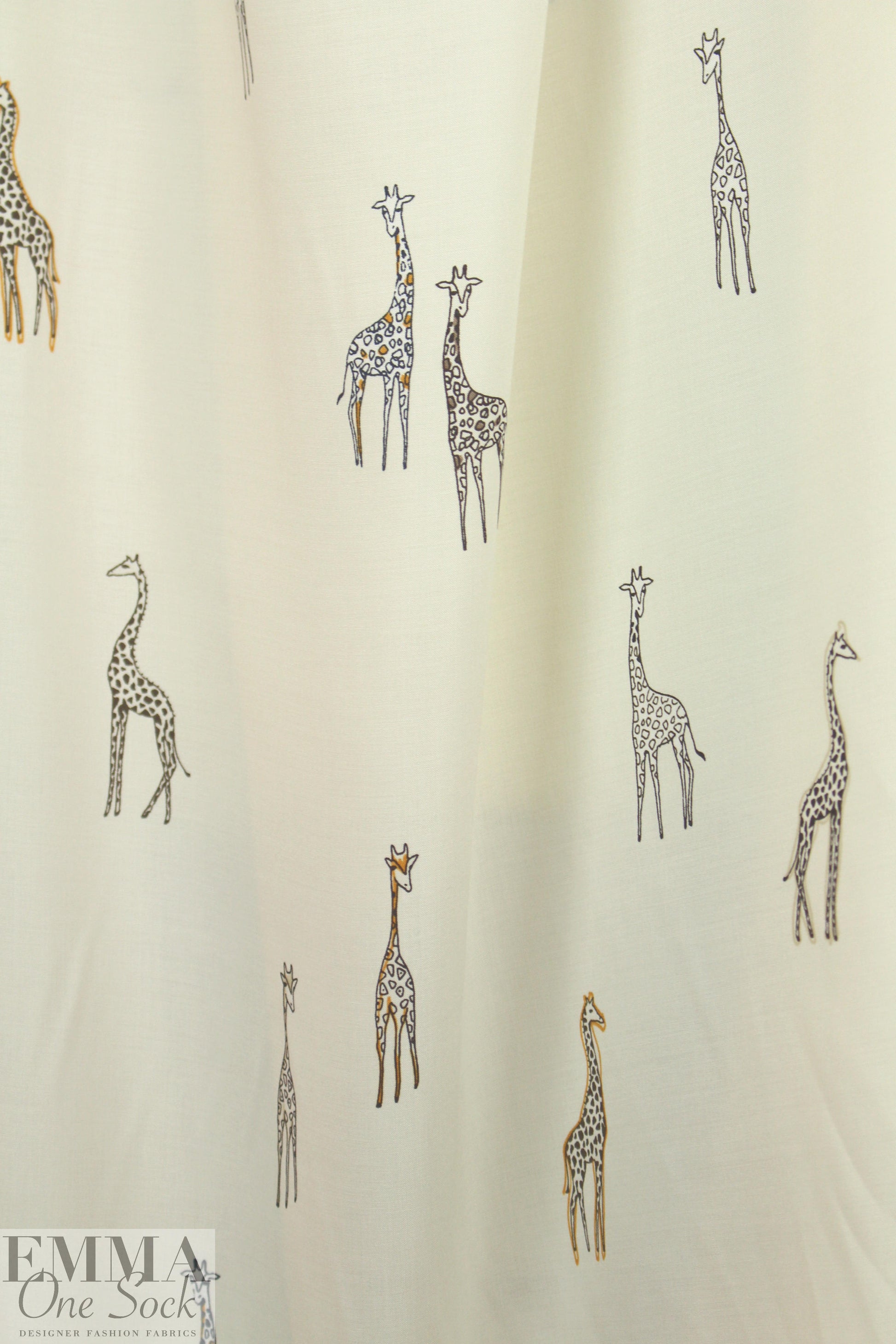 Italian drapey viscose woven - giraffes on ivory