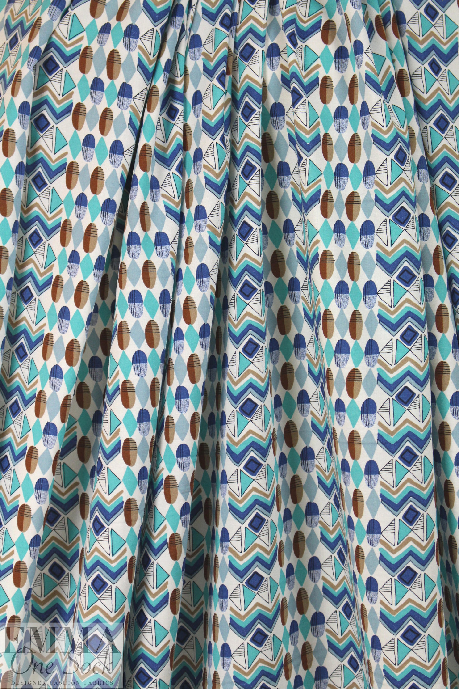 French aqua/nutmeg graphic drapey viscose woven .5 yds