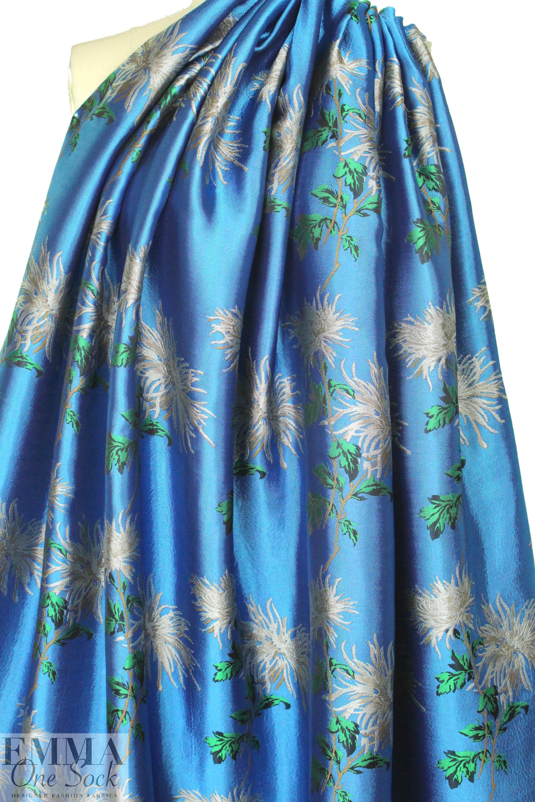 famous designer flowers on blue viscose brocade