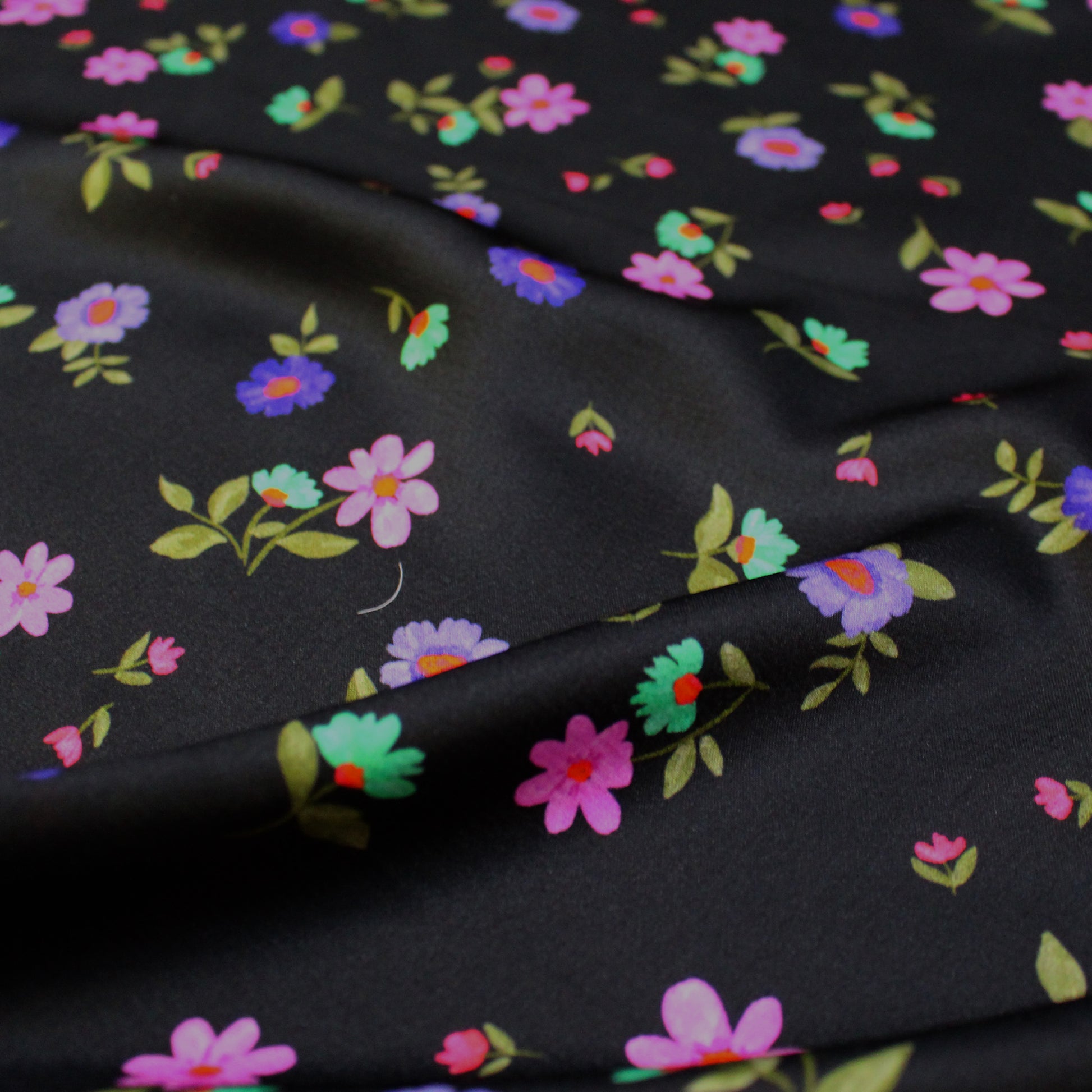 Italian 'painted blooms on black' viscose charmeuse