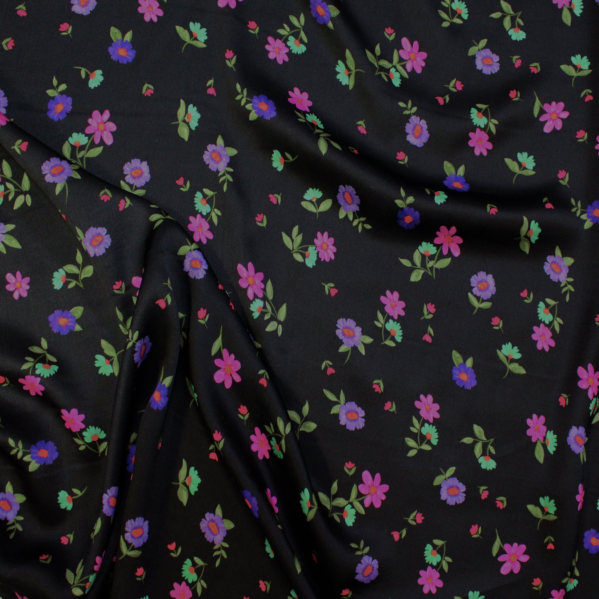 Italian 'painted blooms on black' viscose charmeuse