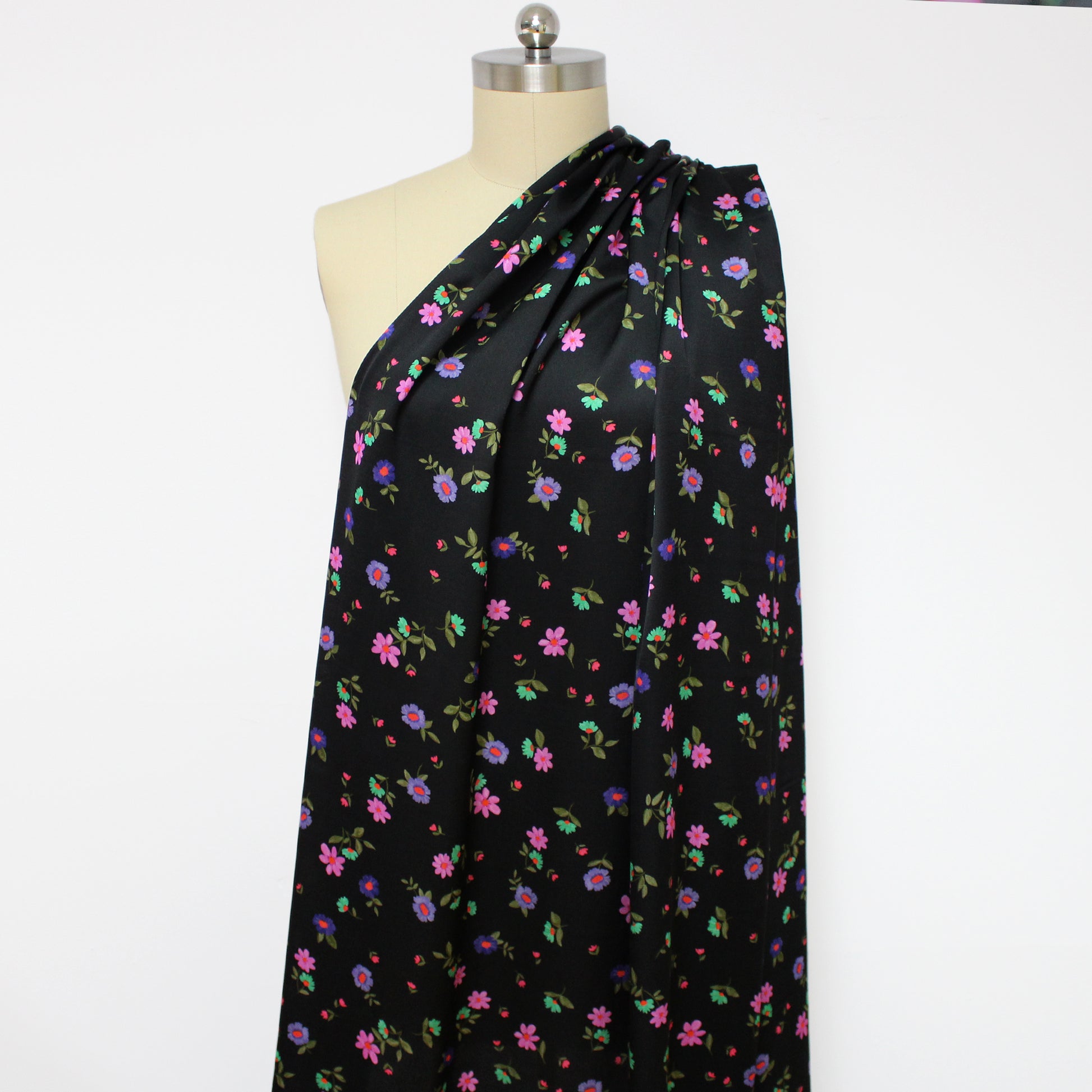 Italian 'painted blooms on black' viscose charmeuse
