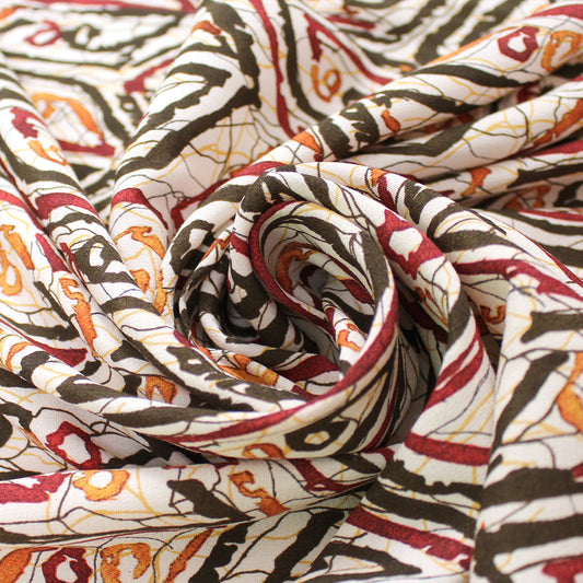 Italian 'open book' batik-inspired viscose crepe woven