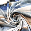 'horizons' stretch viscose knit - denimy blues/earthtones 1.75 yds