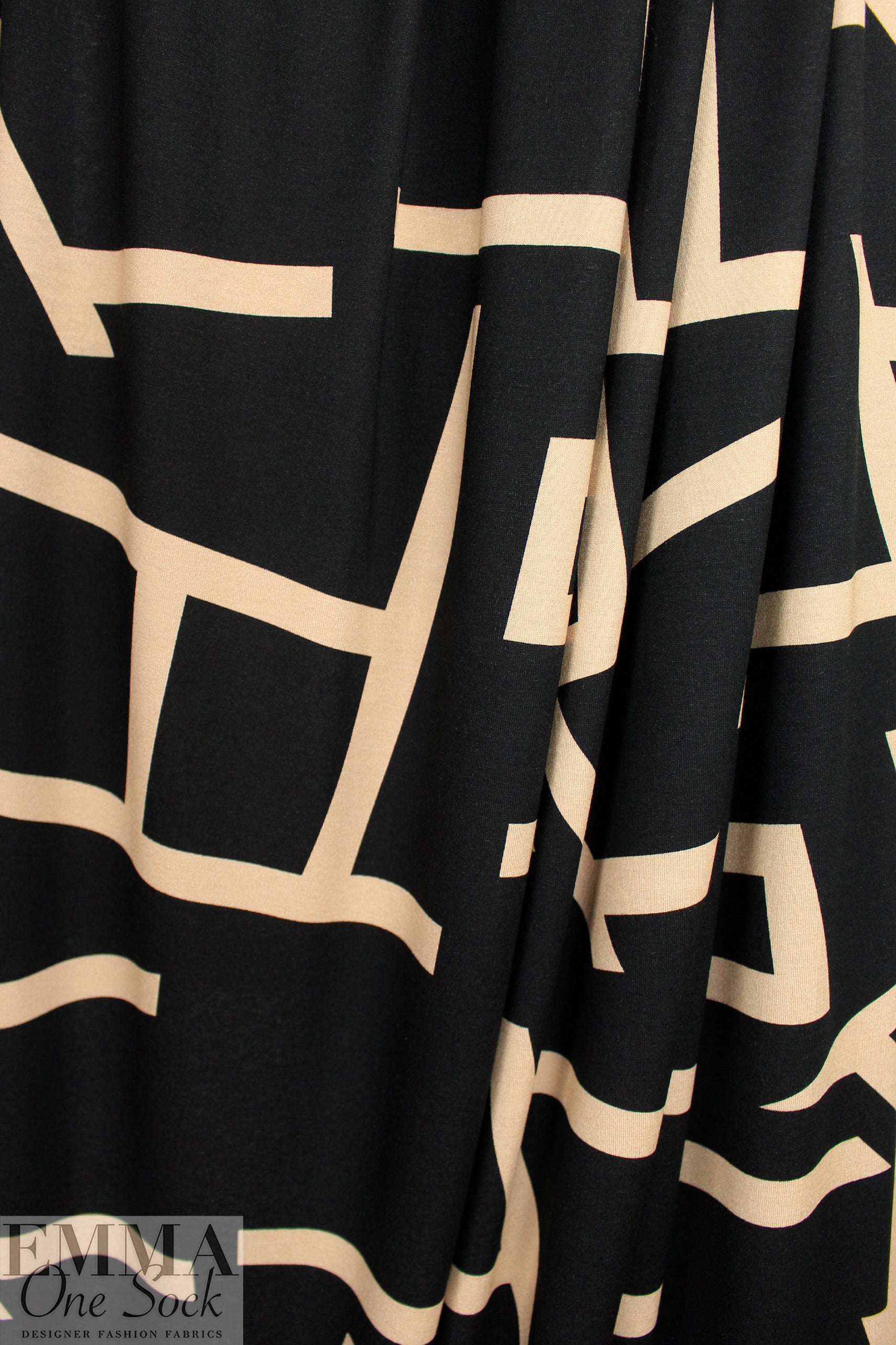 Italian 'kinetic shapes' viscose/spandex knit .5 yds