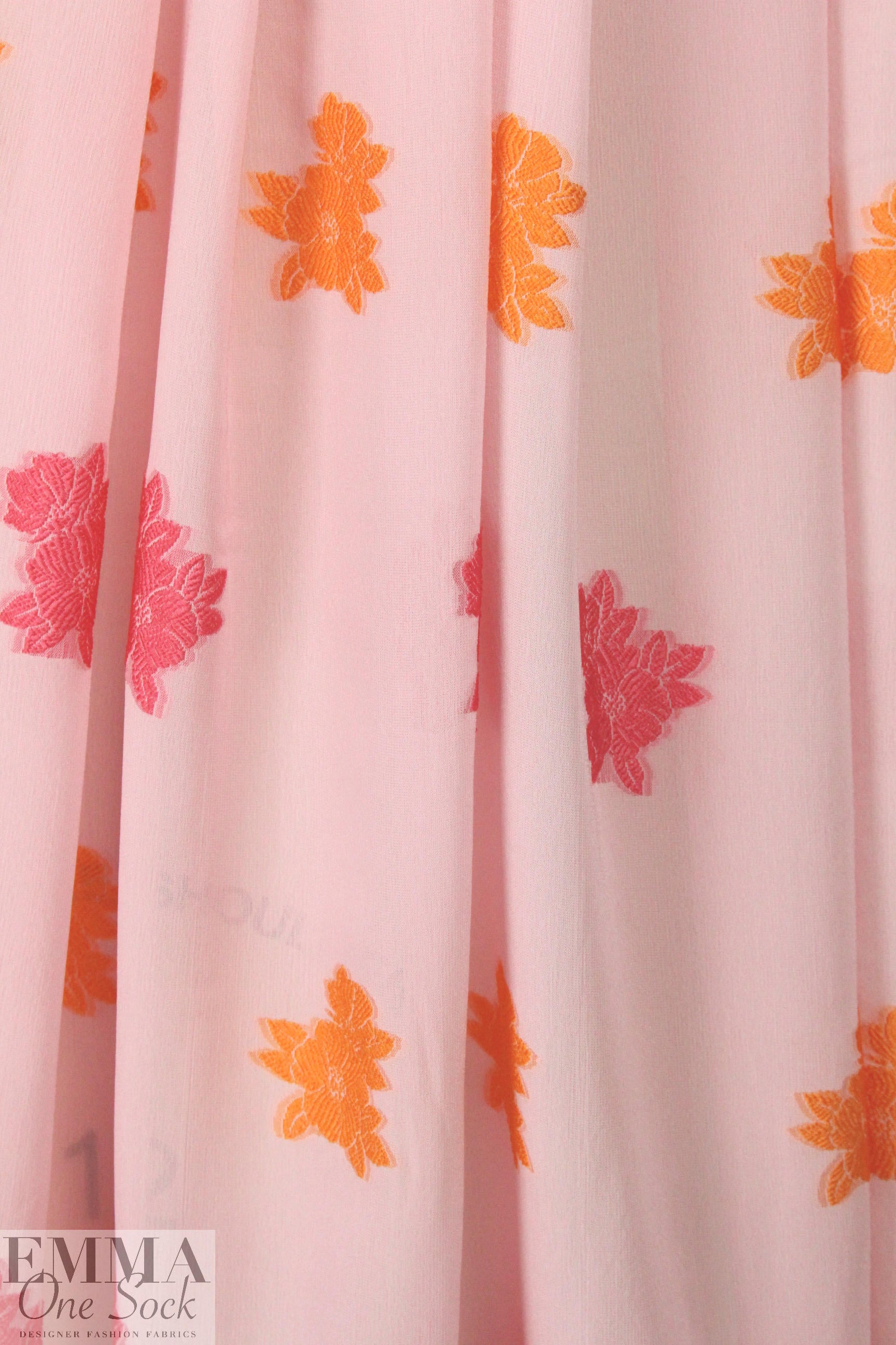 famous designer clipped jacquard - pink/tangerine 1.125 yds