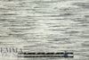 CA designer space dyed ponte - black on creamy white