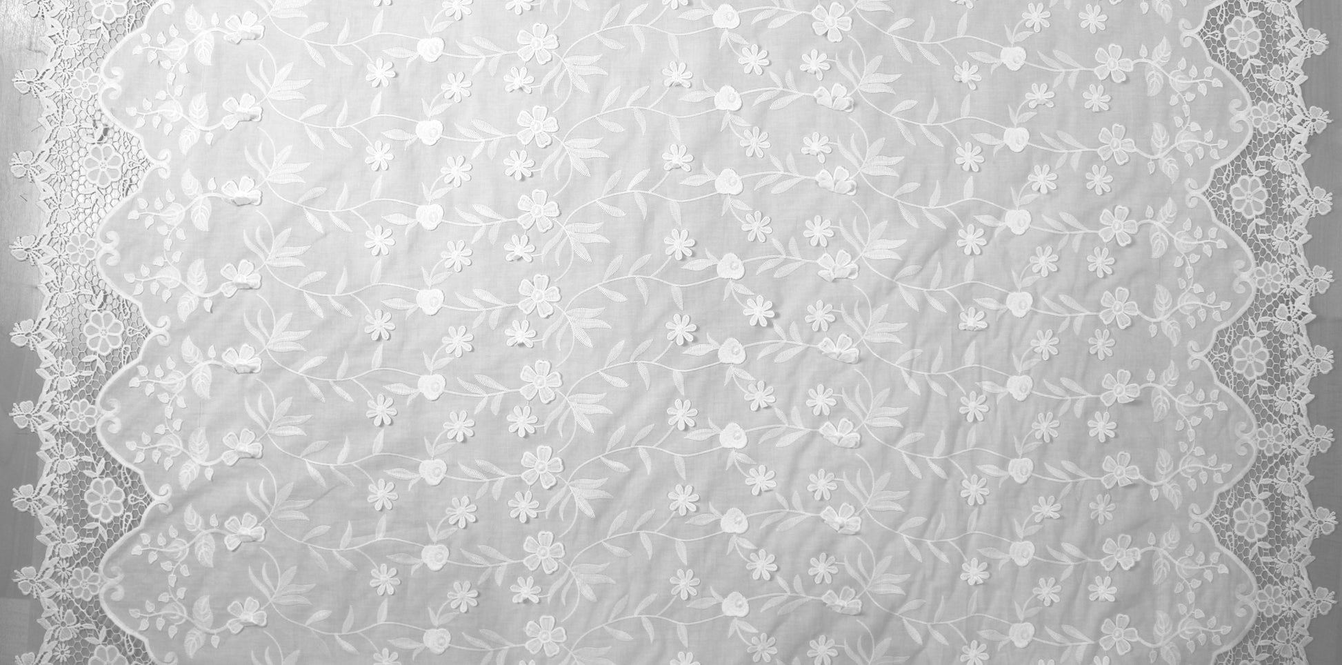 famous designer white 3-D floral embroidered cotton