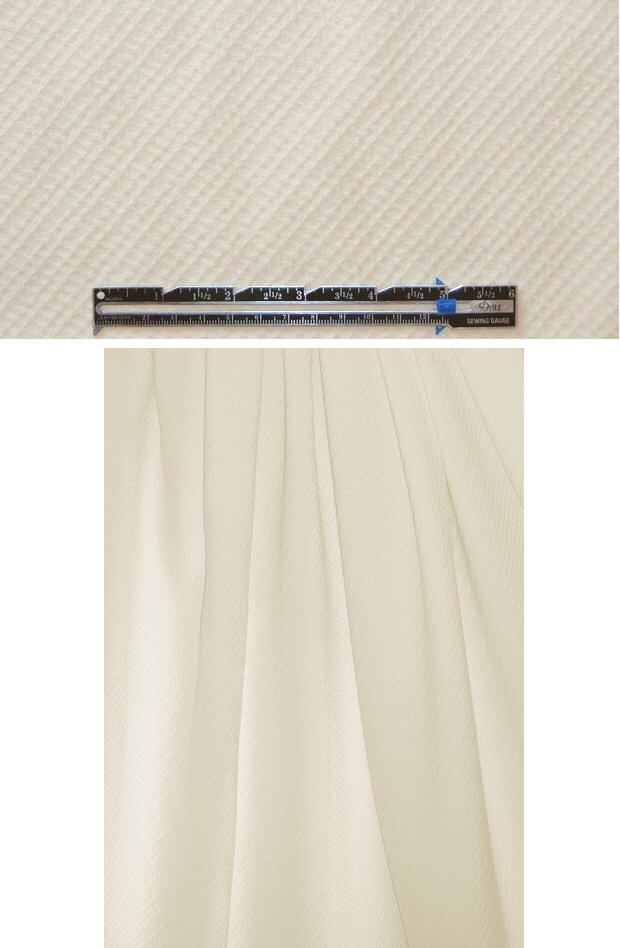 Italian winter white waffle texture woven .875 yds
