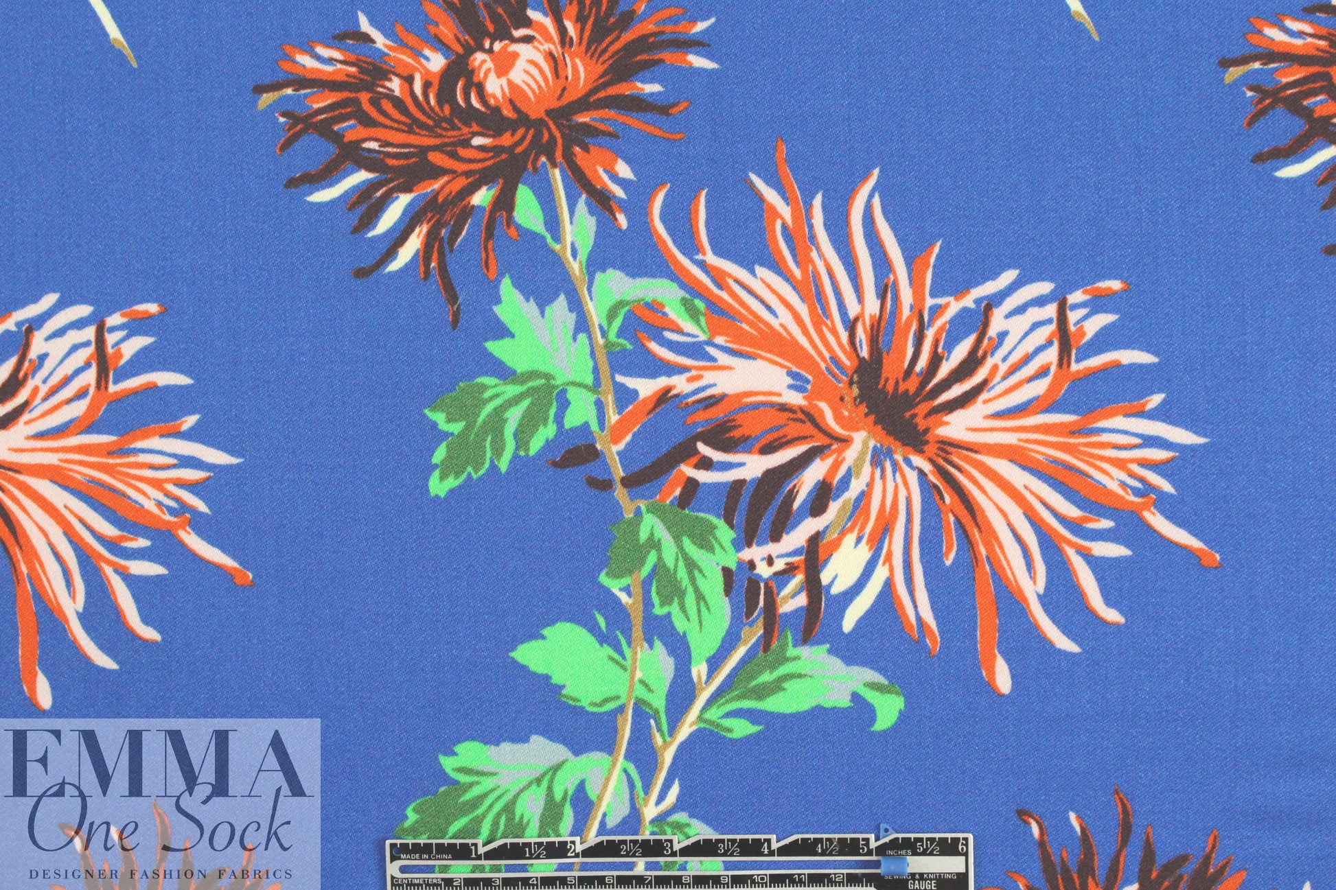 famous designer flowers on blue wool/silk woven