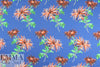 famous designer flowers on blue wool/silk woven