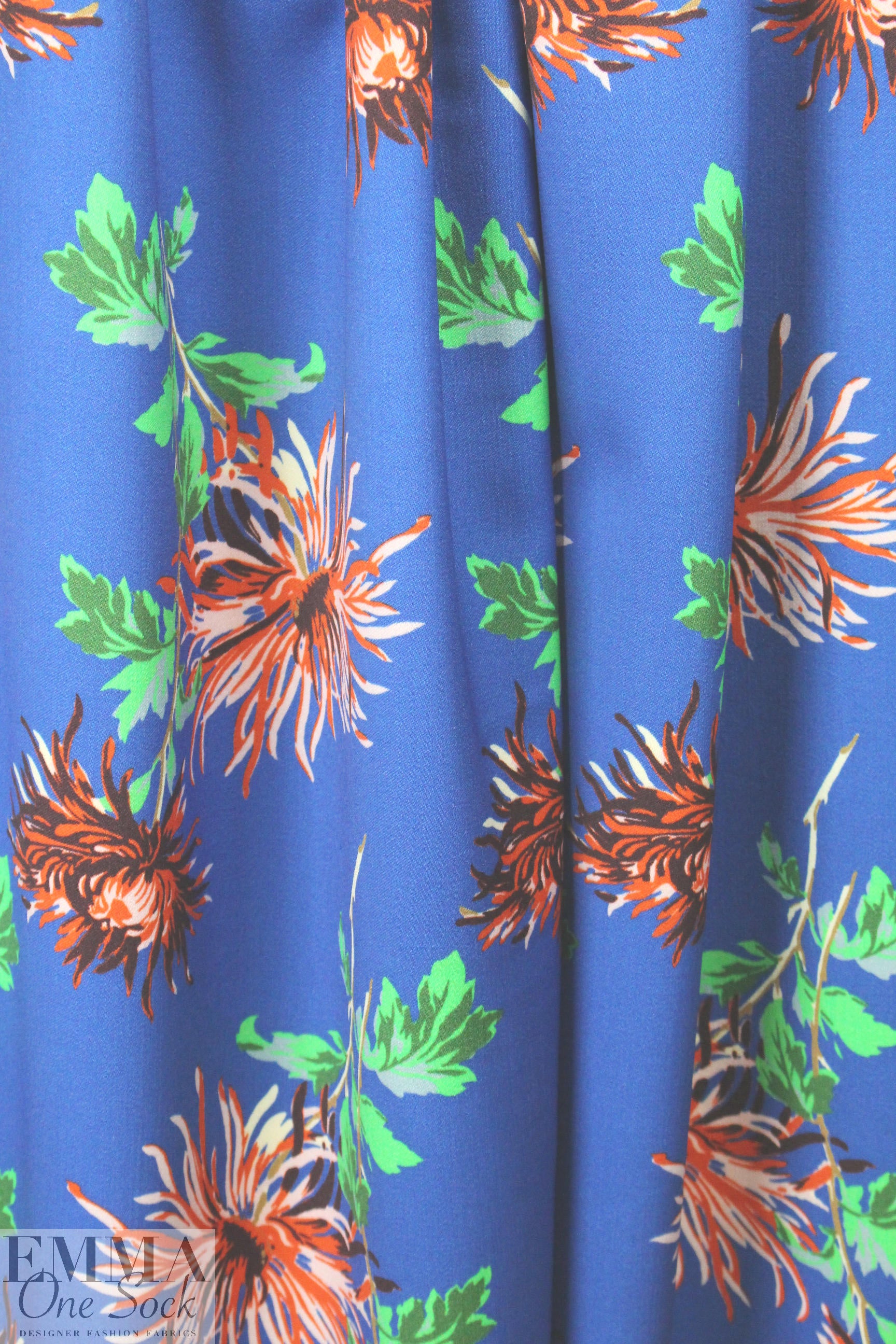 famous designer flowers on blue wool/silk woven 1.5 yd