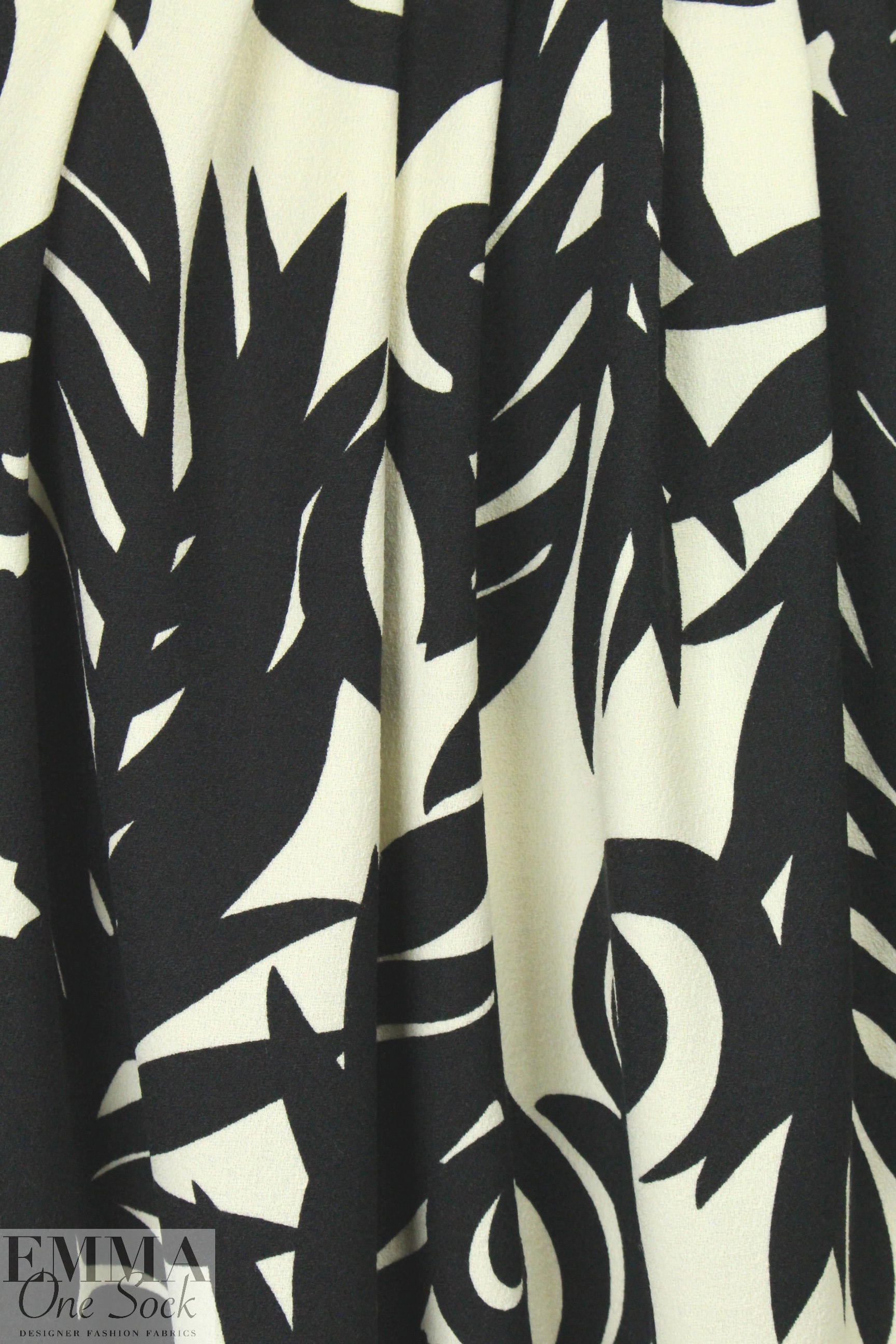 famous designer stylized swirl wool crepe woven