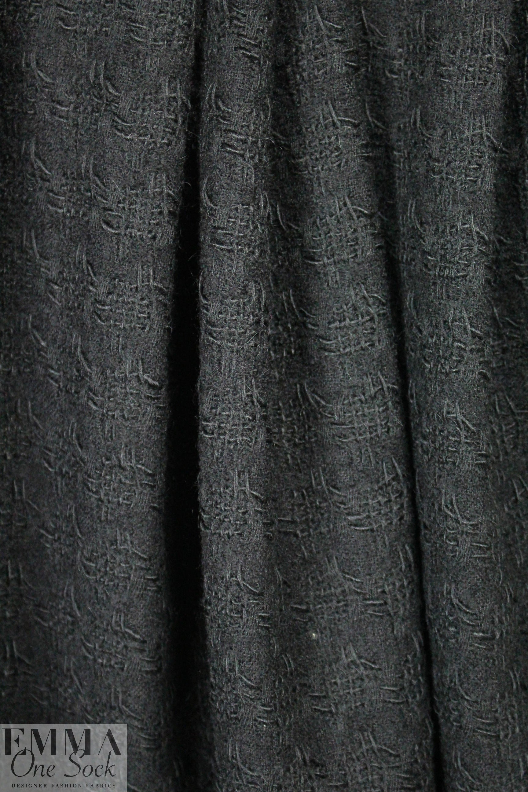 Italian black wool fancy weave suitting .66 yd